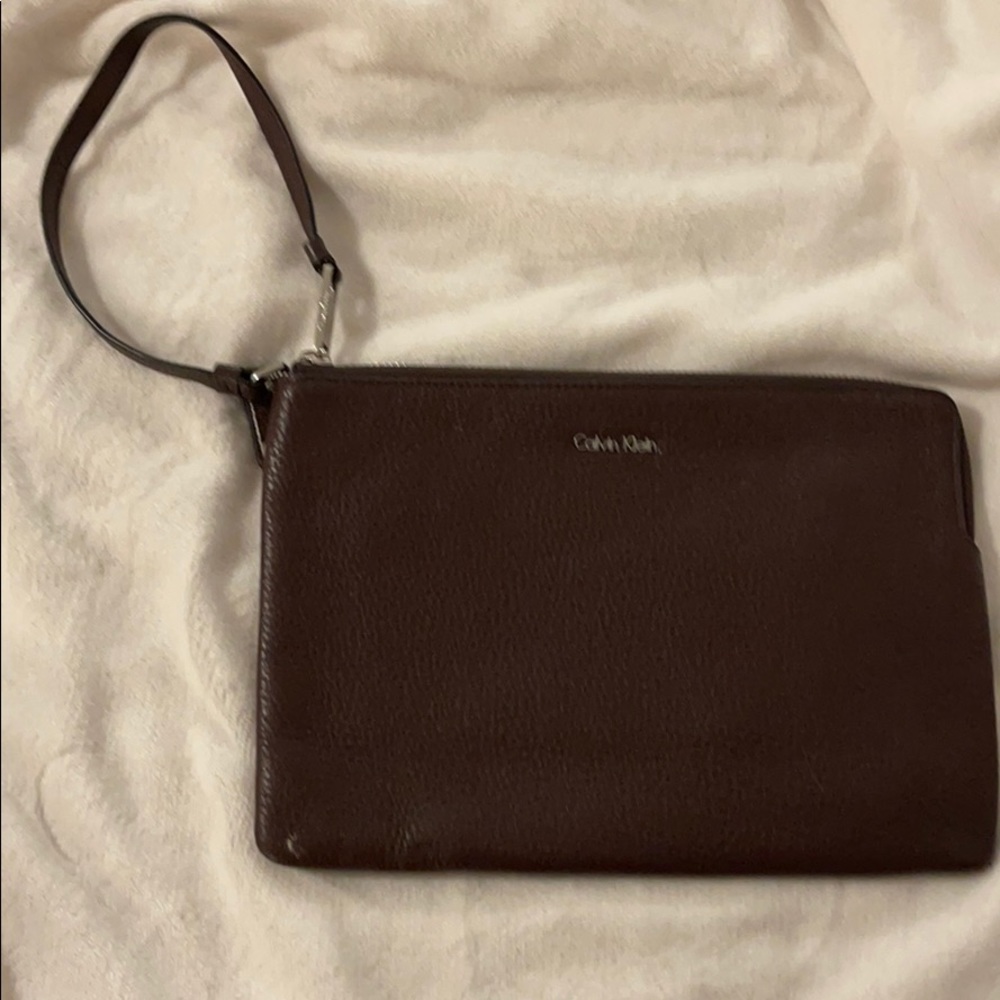Calvin Klein oversized pouch with wrist strap